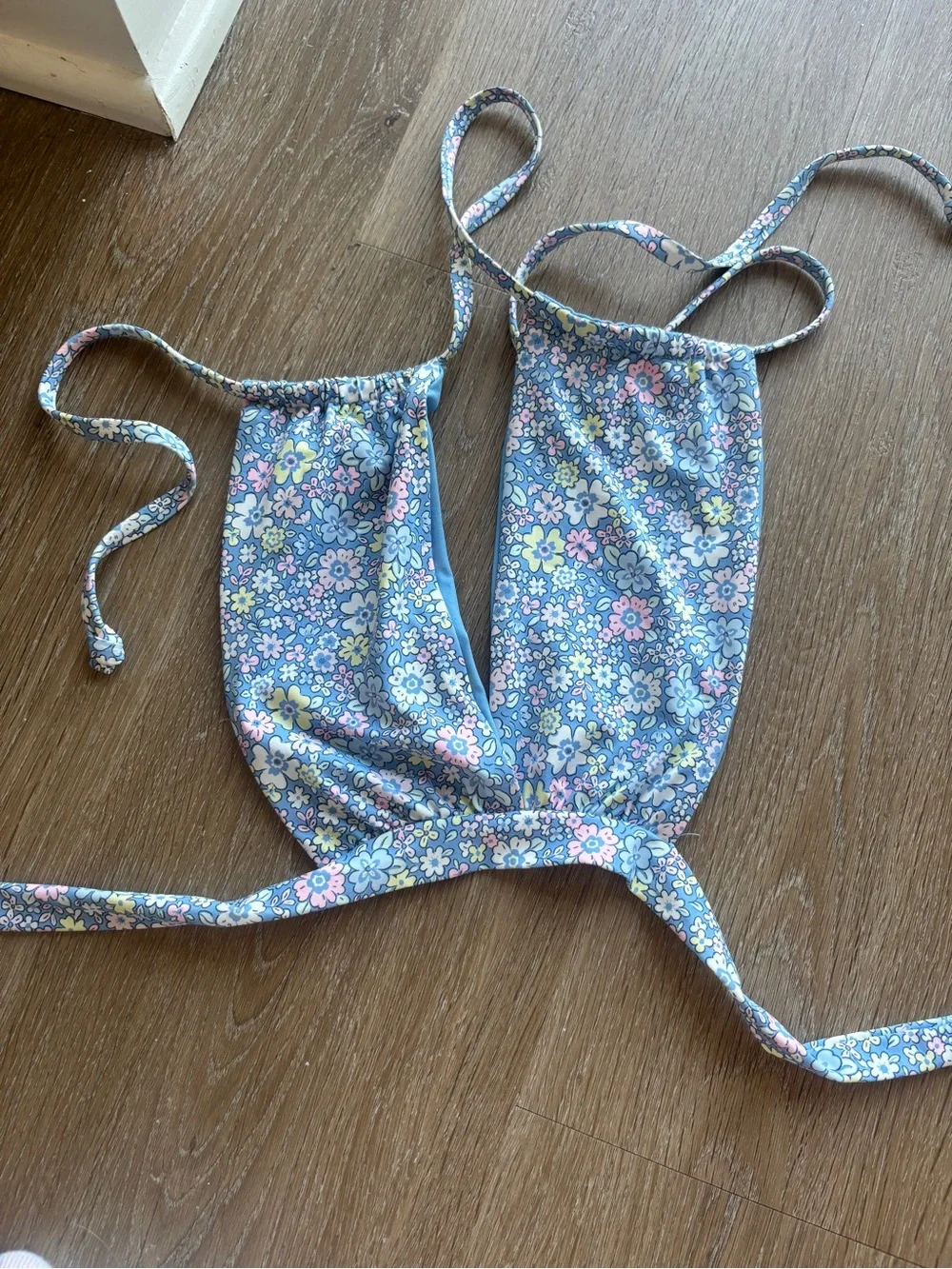 Frankie’s Bikinis blue floral bikini top and medium bottom